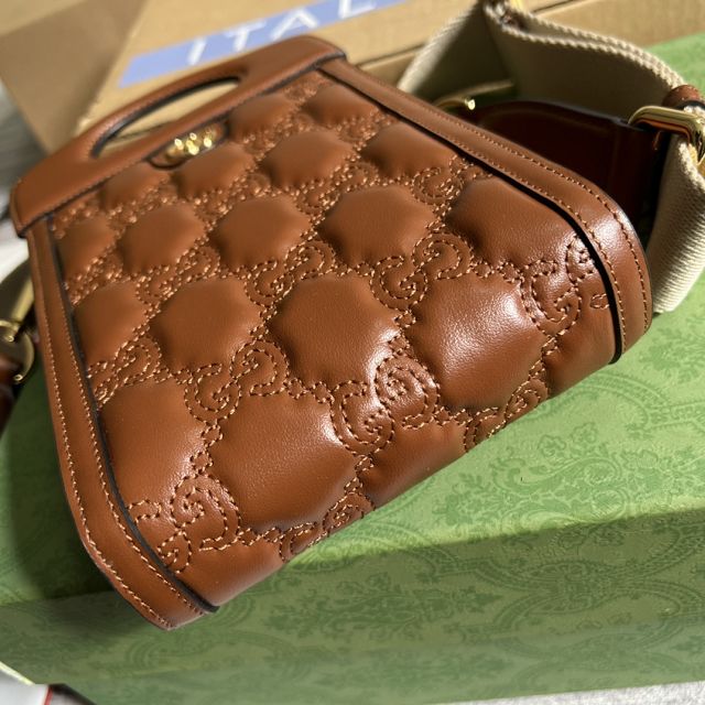 GG original matelasse leather top handle mini bag 723776 brown